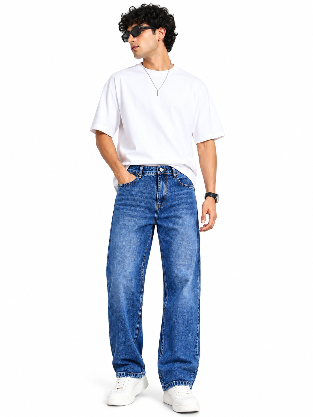 Model wearing blue loose fit men's jeans